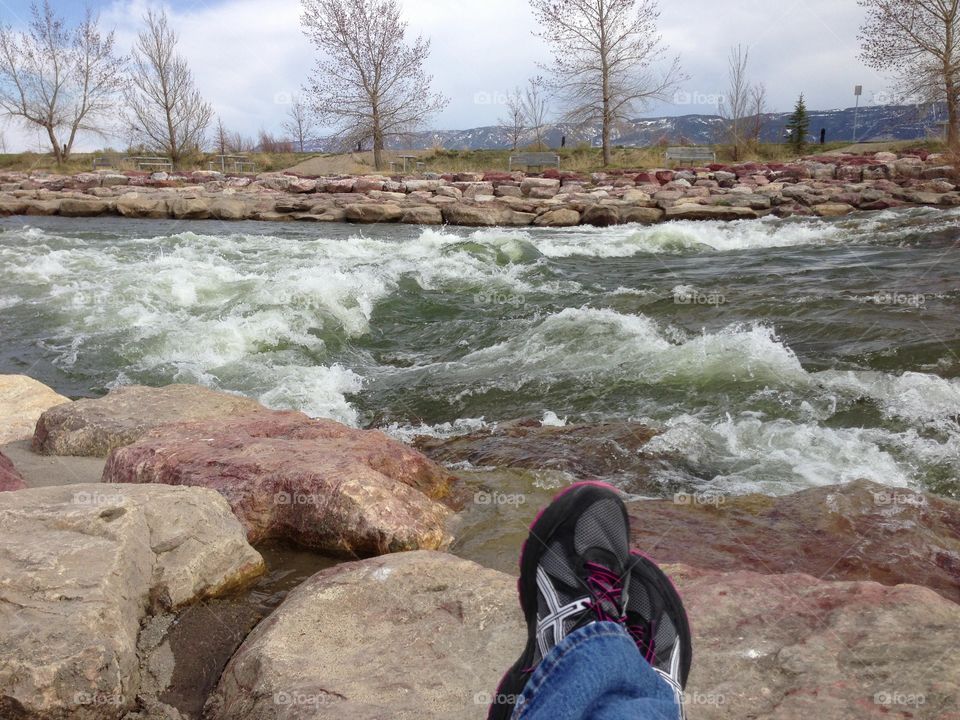 River Therapy. Sitting on the banks of the North Platte River with mountain in the background and rapids in front of me