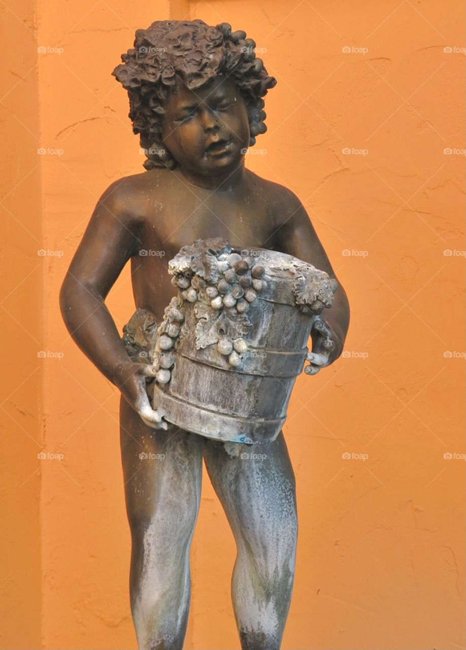 Statue of a Boy with Grapes