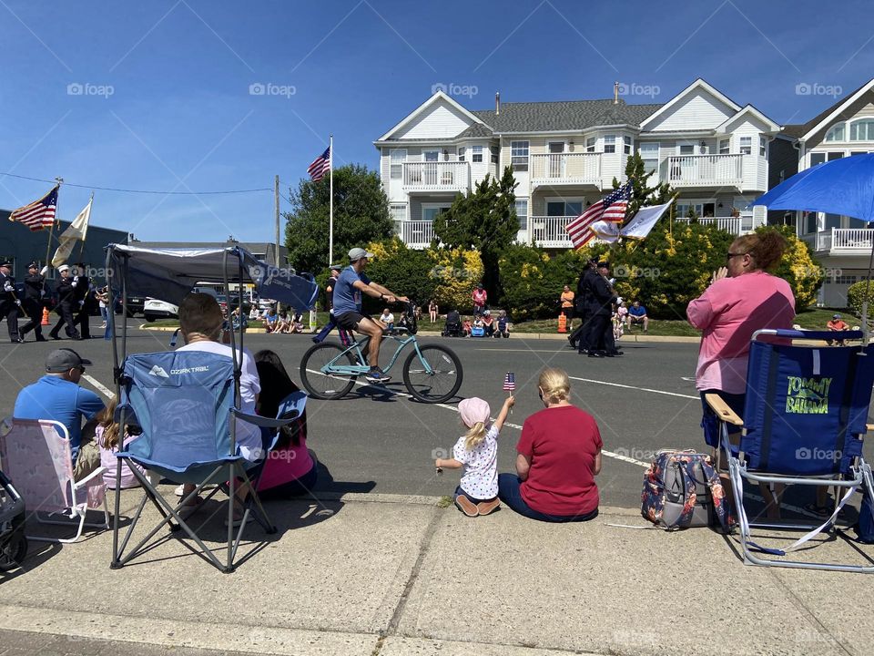 This photo was actually taken at a Memorial Day parade In Bradley Beach, NJ, but I think the spirit and colors of the scene are in keeping with Independence Day. The little girl holding up her flag shows the pride in freedom that is so American.