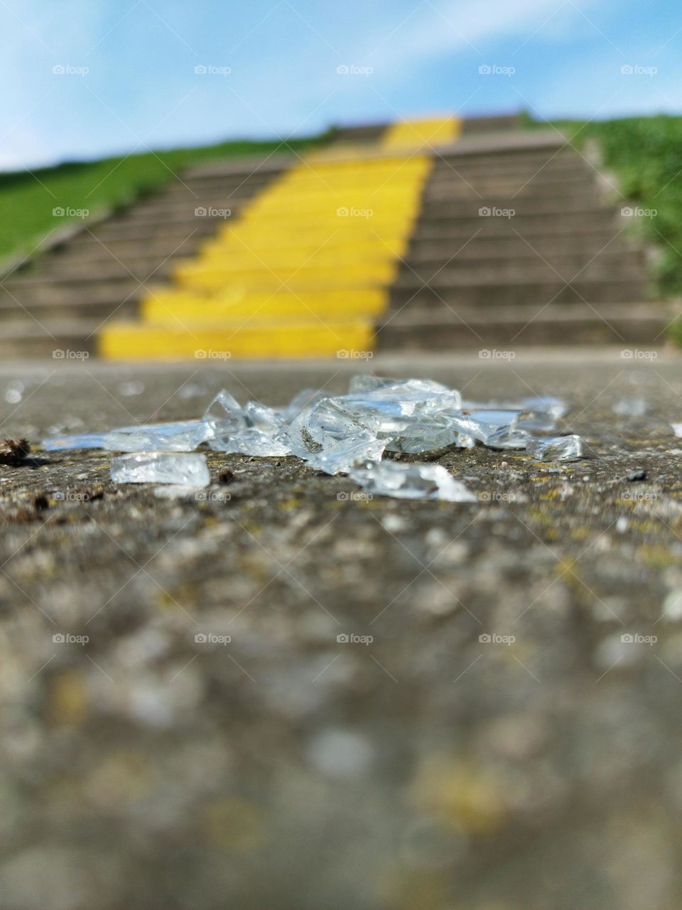 Broken glass reflects the light