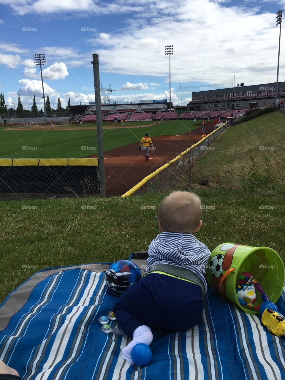 A baby boy who loves baseball