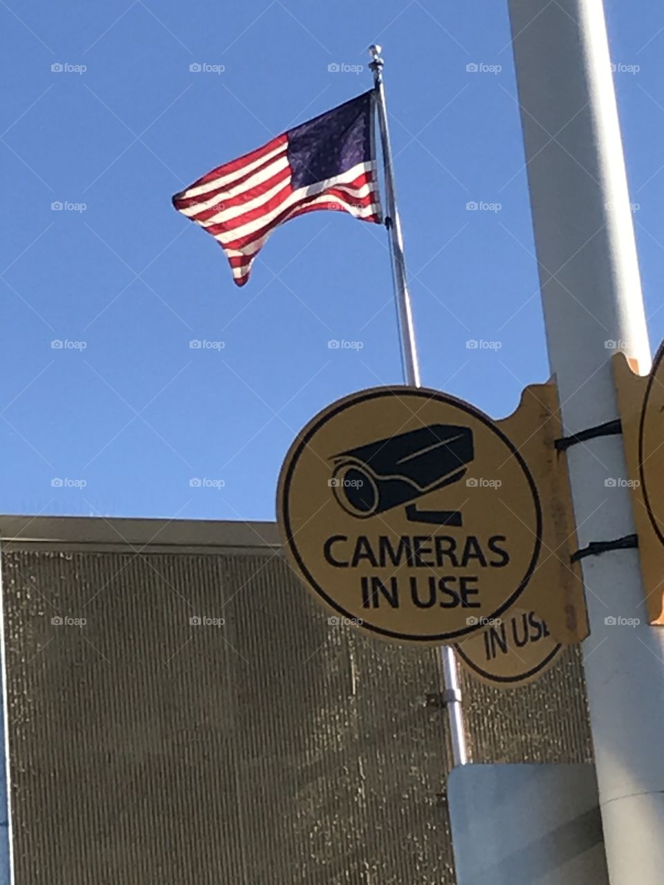 US flag flying high.