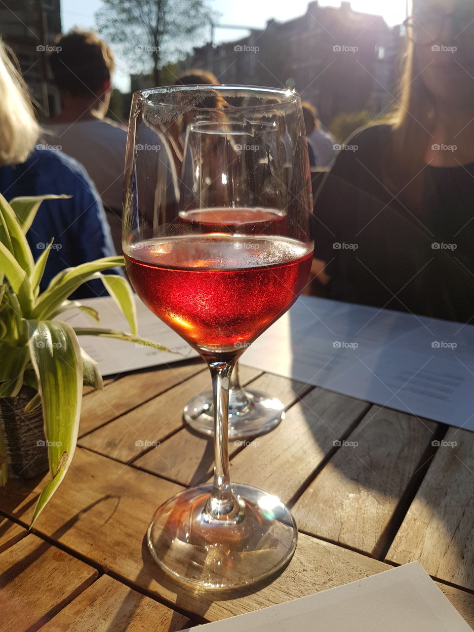 A glass of Rosé in the evening light, Amsterdam.