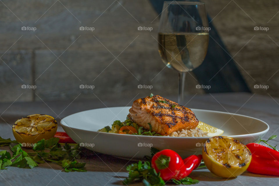Grilled Salmon With Glass of White Wine