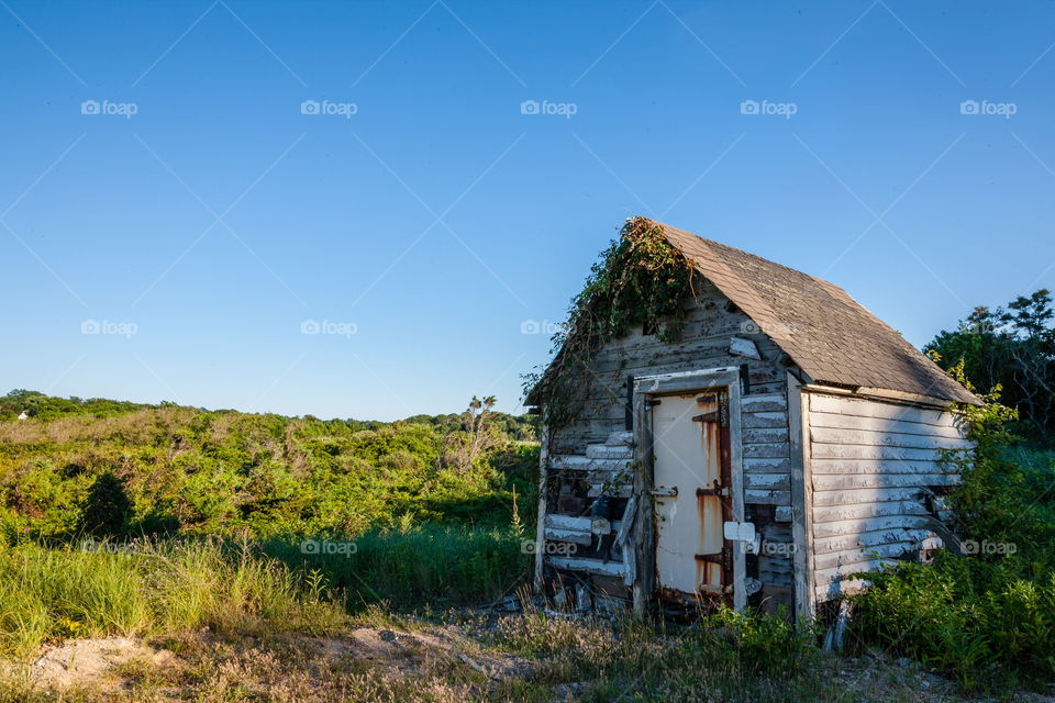 Old shack next to countryside 