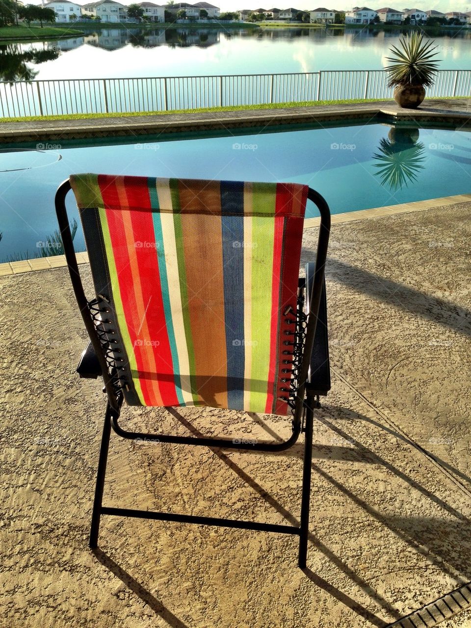 Lounge chair by pool