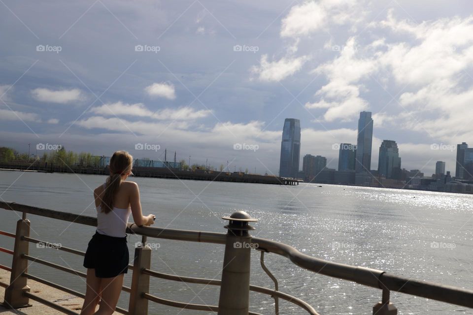 Young woman  enjoying time by the river 