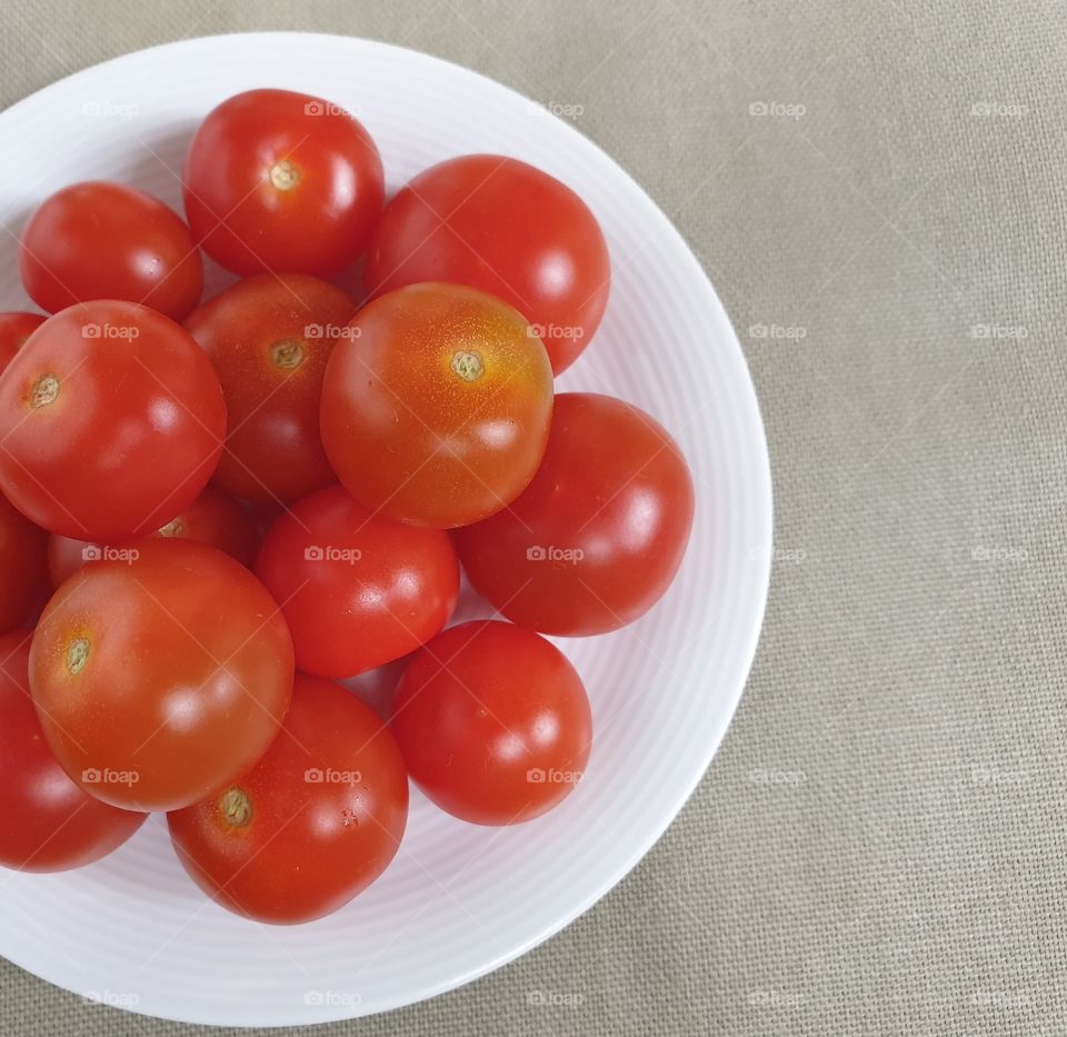 Tomatoes in white plate