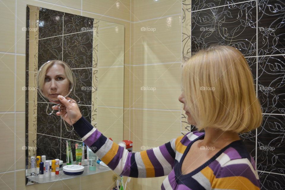 woman portrait reflection in mirror
