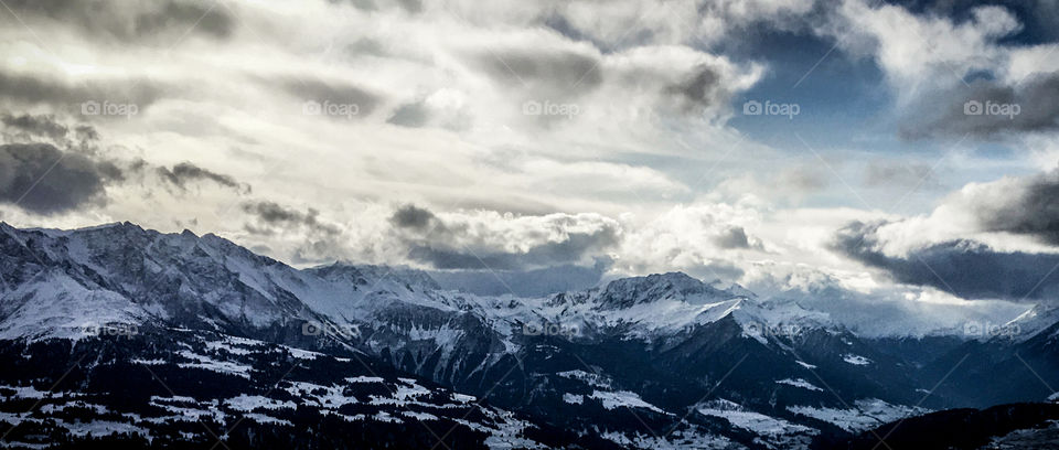 Swiss Alps in a bright sunny day with bright snow