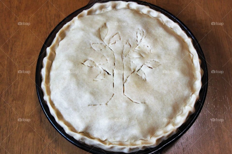 Pie with a tree design