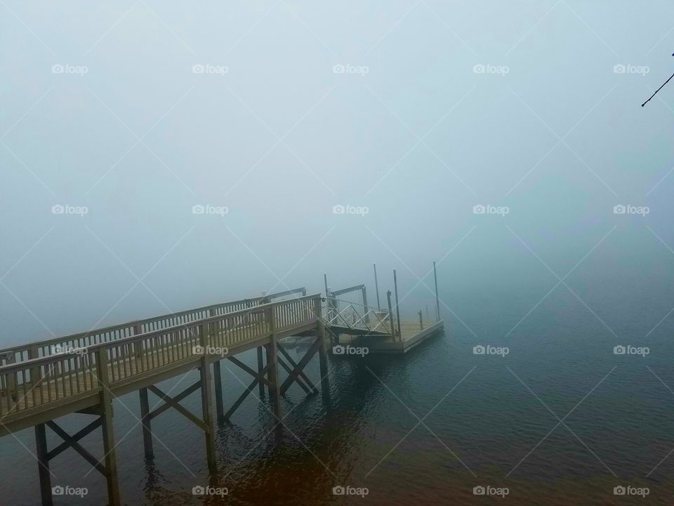 dock in the fog.