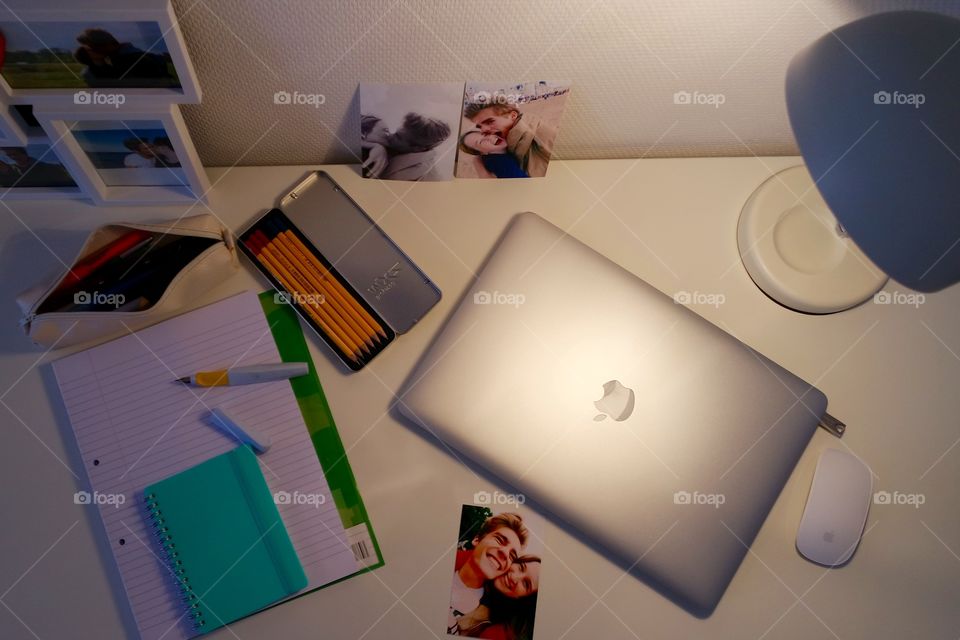 On this Photo, you can see my white desk. As laptop, I use a MacBook pro 15 inch, because I am a Multi Media Production Student.