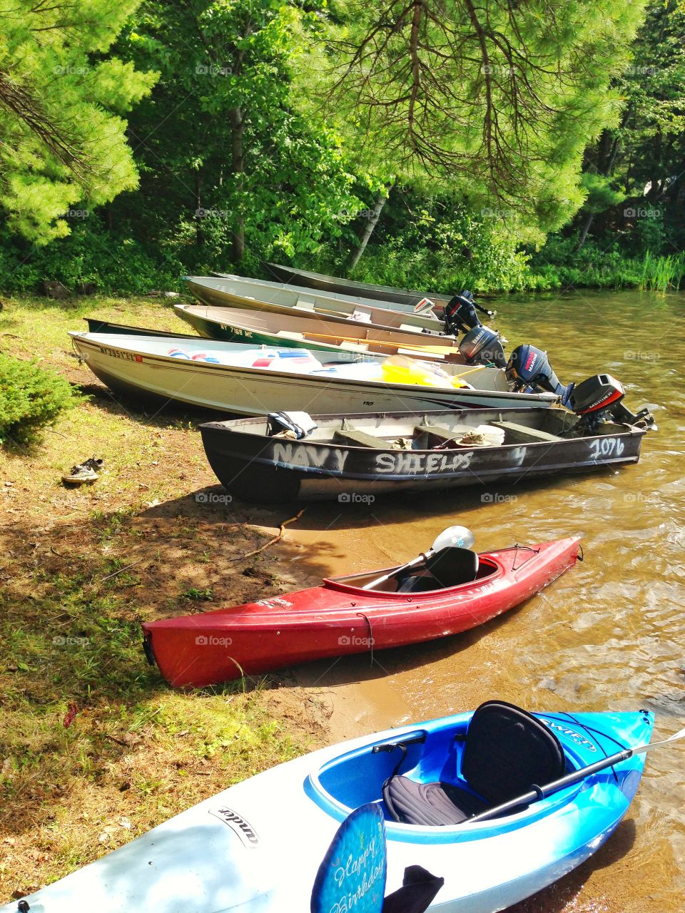 Lake party. Boats all docked on the lake shore