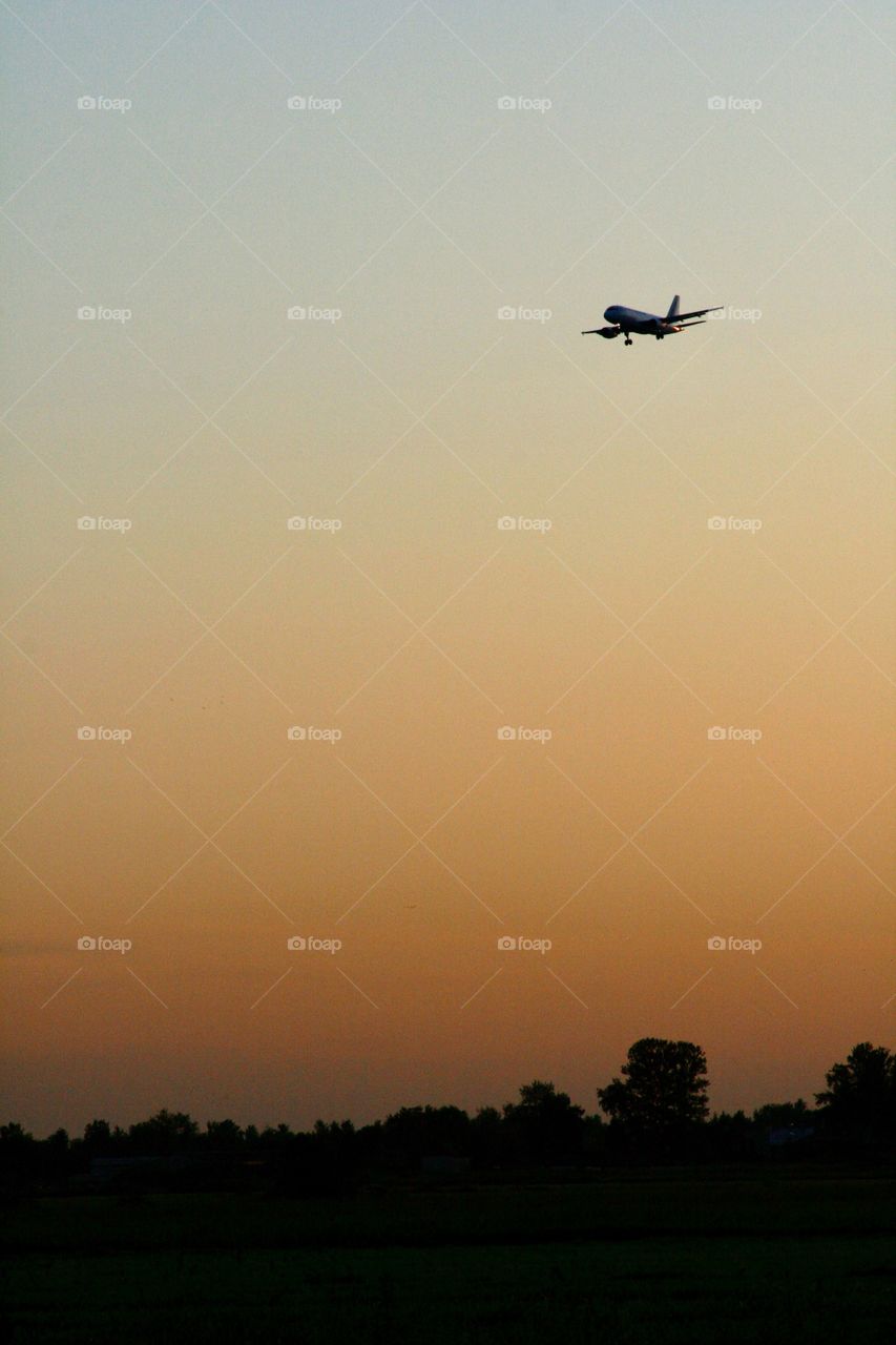 Sunset and airplane 