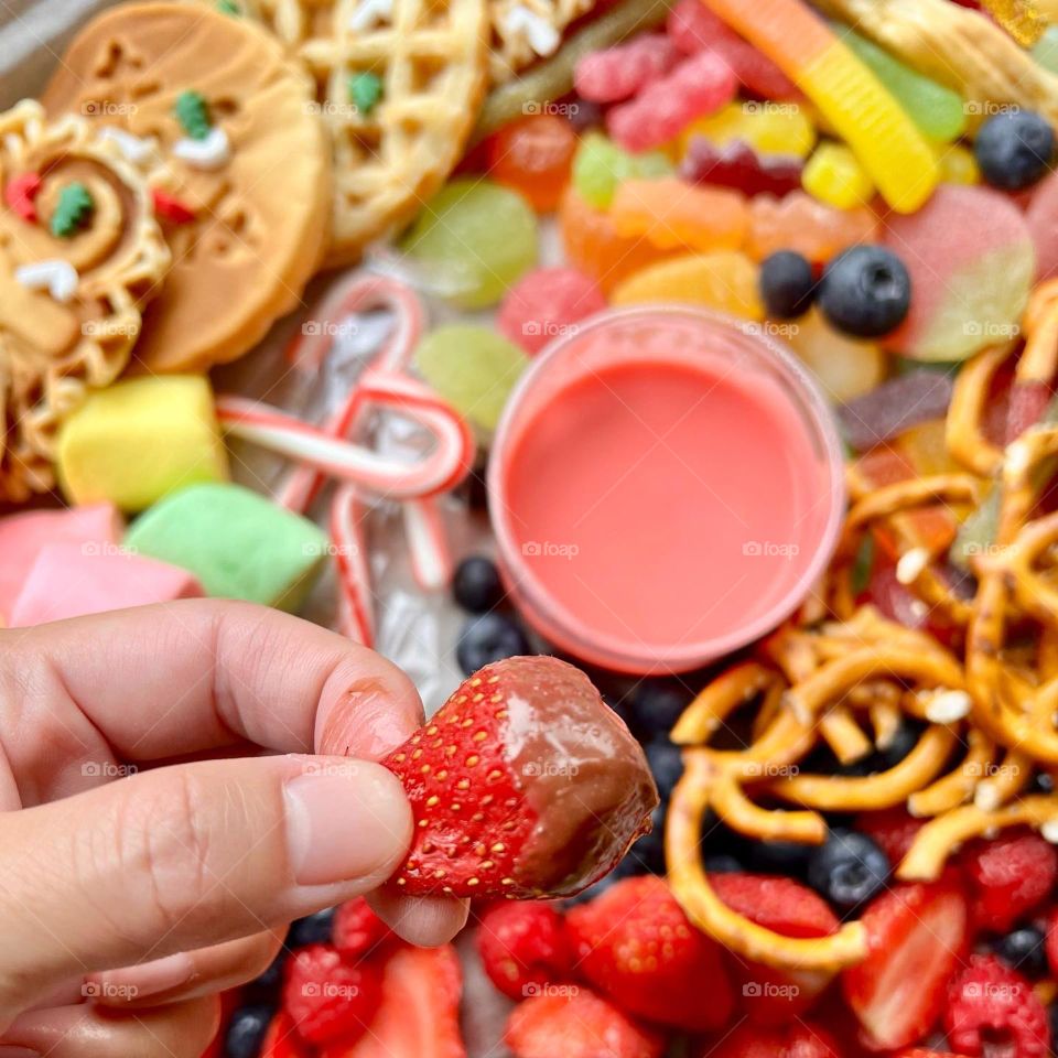 Festive party box full of yummy goodies of gummies and waffles 