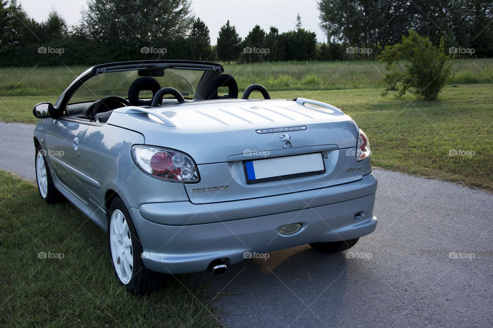 peugeot 307 convertible. Peugeot 307 convertible with hood down at the countryside