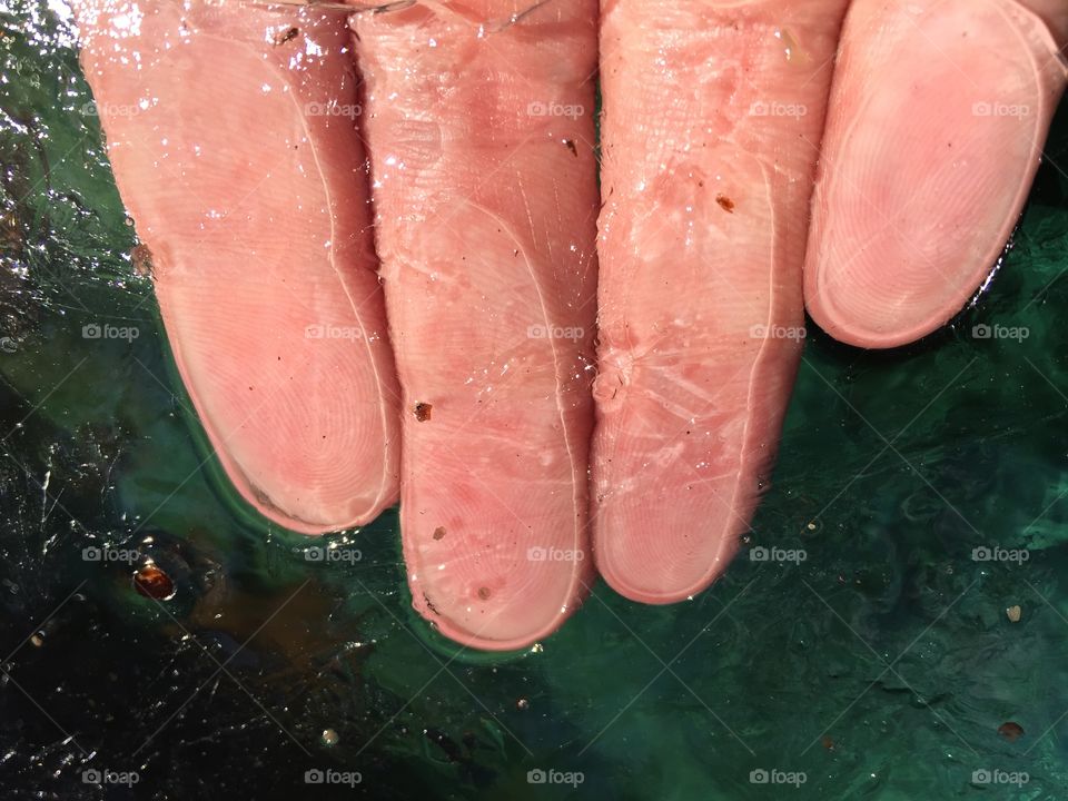 Fingers under ice