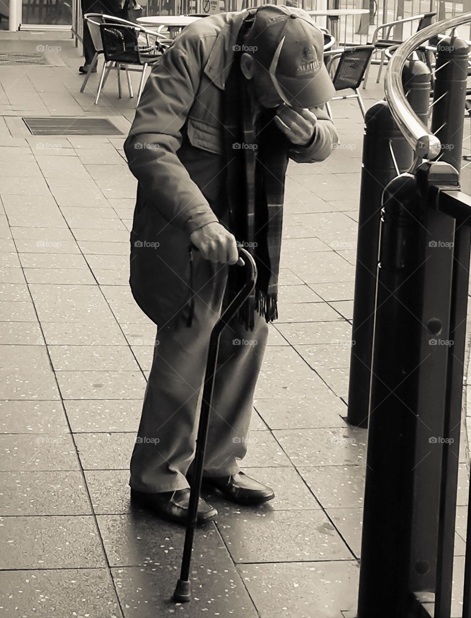 Old man with cane downtown Adelaide south Australia 