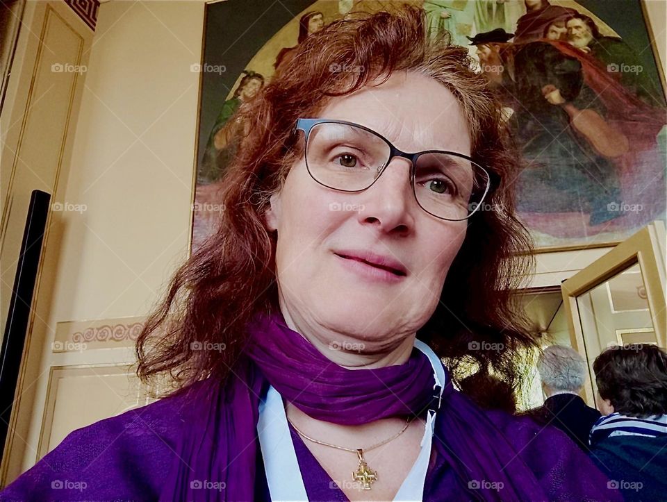 The young lady is standing in the lobby of the “Maximilianeum” in “Munich” that has been housing the “Bavarian State Parliament” from 1949 to present and the “Bavarian Senate” from 1949 to 1999. 2024. Hypnotic Productions