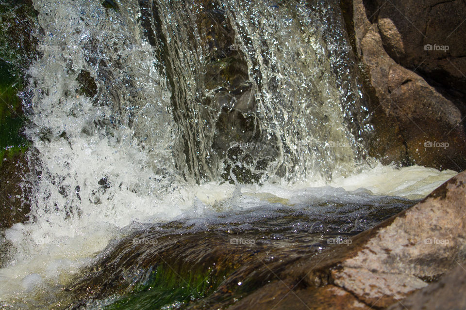 turbulent waterfall in natural river