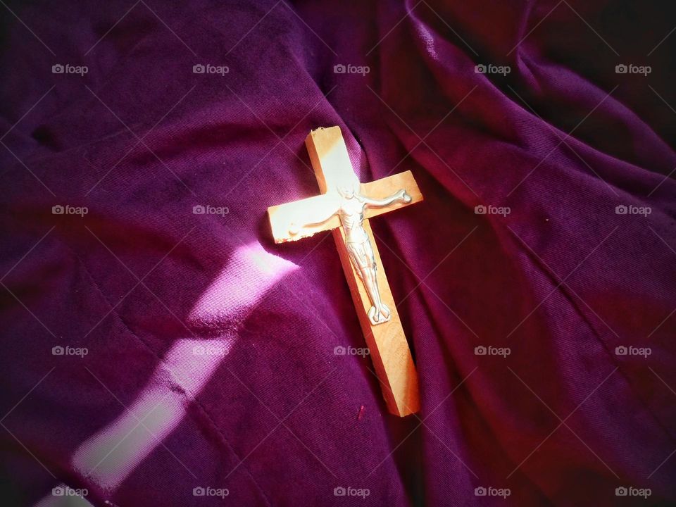 orthodox cross on purple background