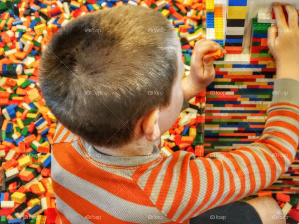 Boy And Building Blocks. Young Boy Building With Lego Bricks