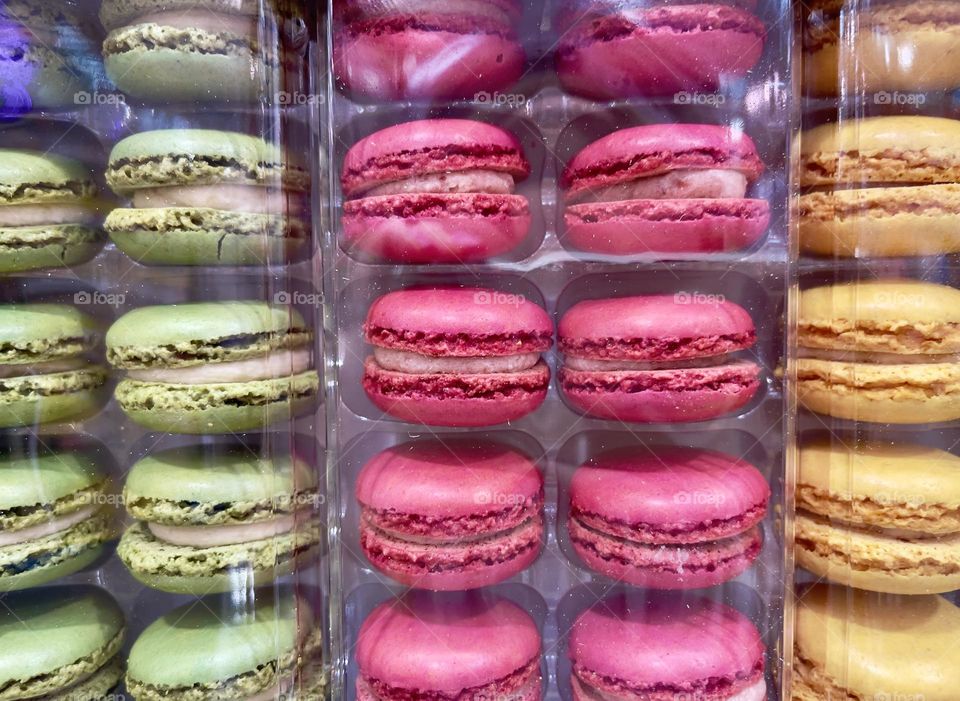 Green, pink and yellow macarons 