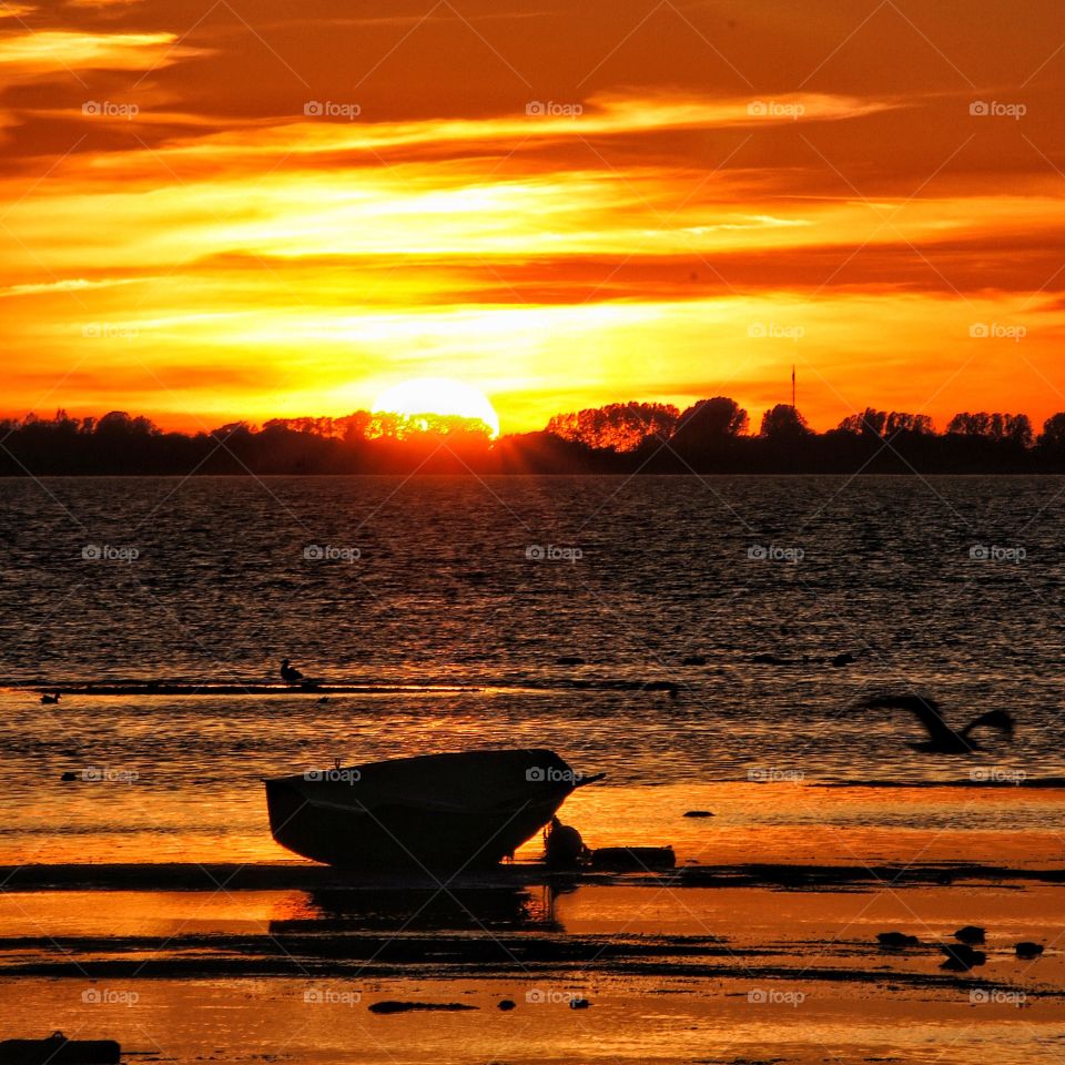 Boat in sunset