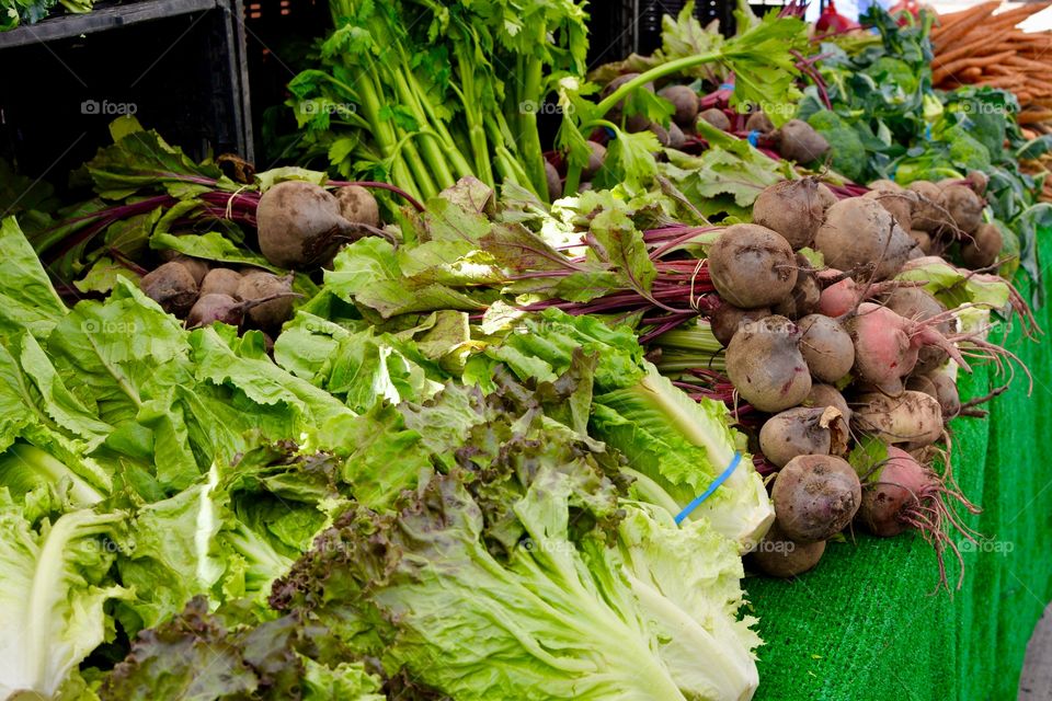 Table of Fresh,Organic locally grown Vegetables at a Farmers Market.