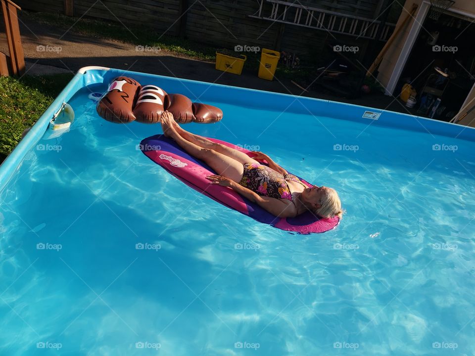 floating in the pool.