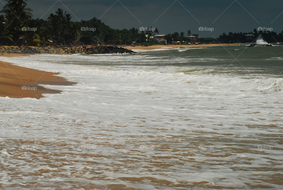 dark blue sky and ocean cost before the storm 