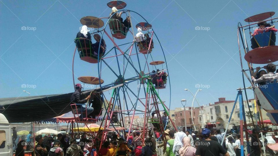 Beautiful wheel and nice moment of happiness in vacation.