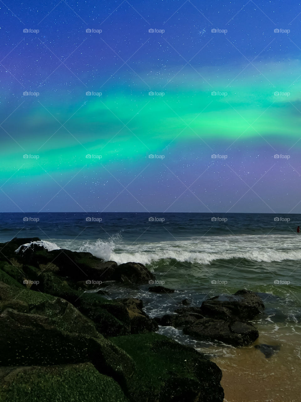 Northern Lights Over The Ocean