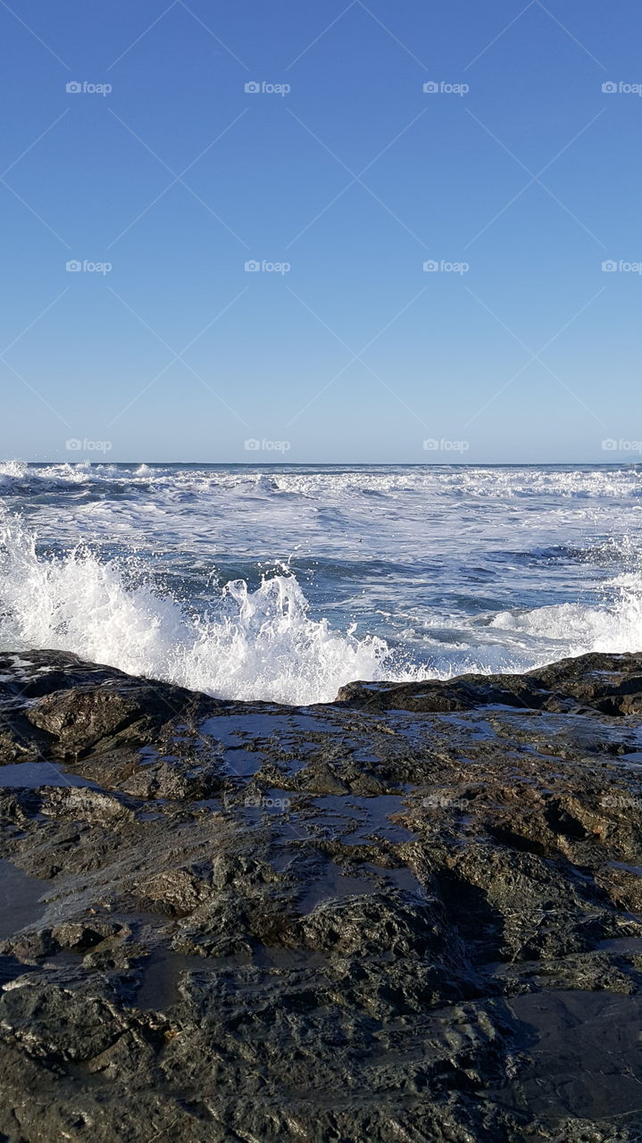 waves hitting the rocks