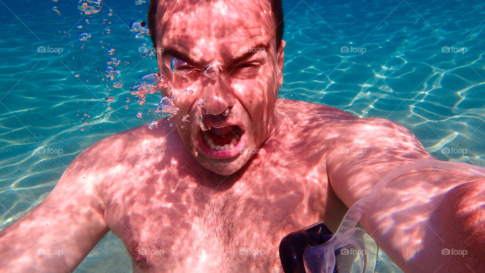 Man swimming underwater