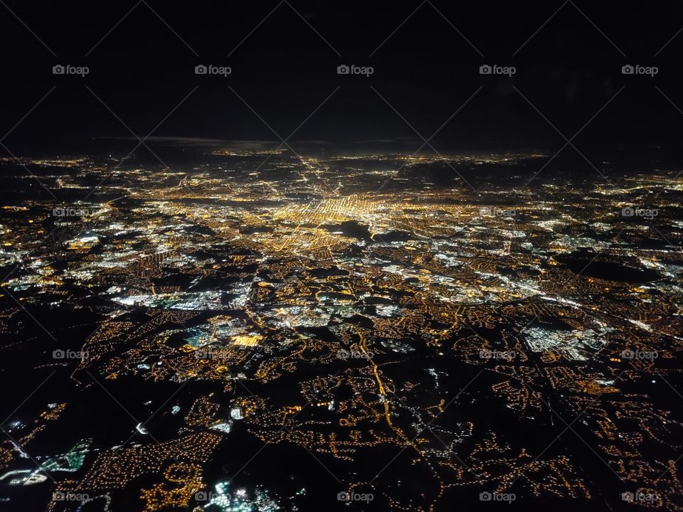 An evening in the clouds of viewing the twinkling city lights of Baltimore, Maryland