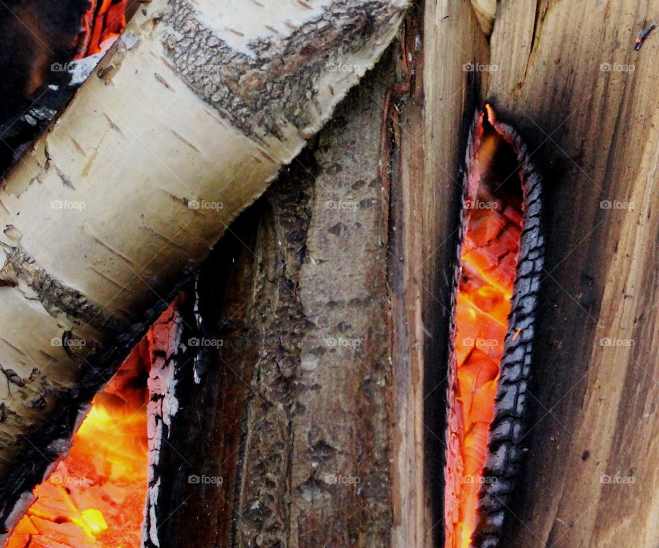 Glowing logs, christmas market.