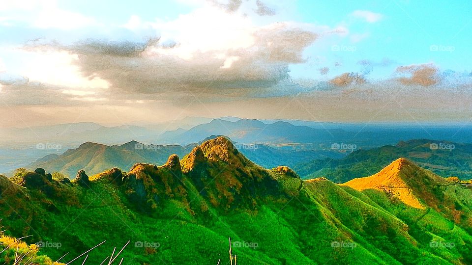 Scenic view of green mountains