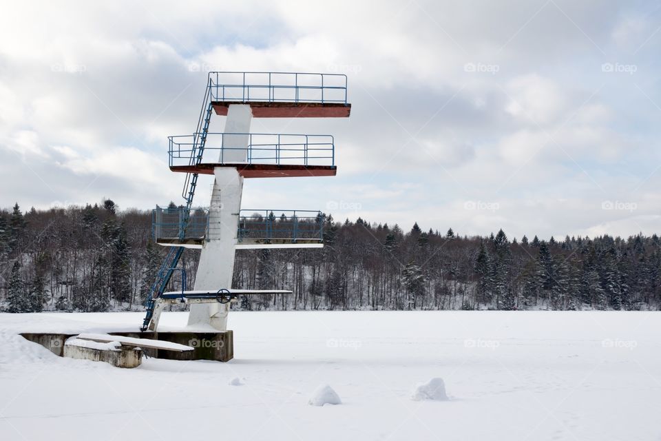 Longing for summer. Diving tower in snow, Sweden - Längtar efter sommar . Hopptorn i snö, kåsjön Partille Sverige 