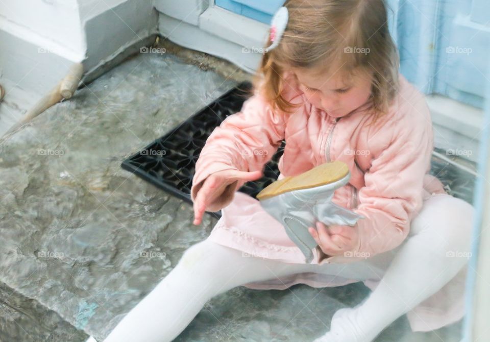 Little girl with silver boots