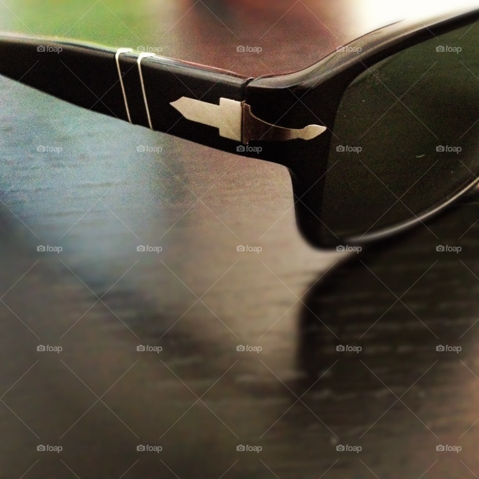 Sunglasses on desk 