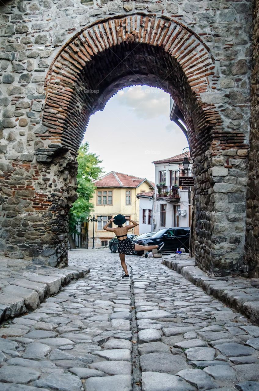 Young Female Ballerina Dancing Outside