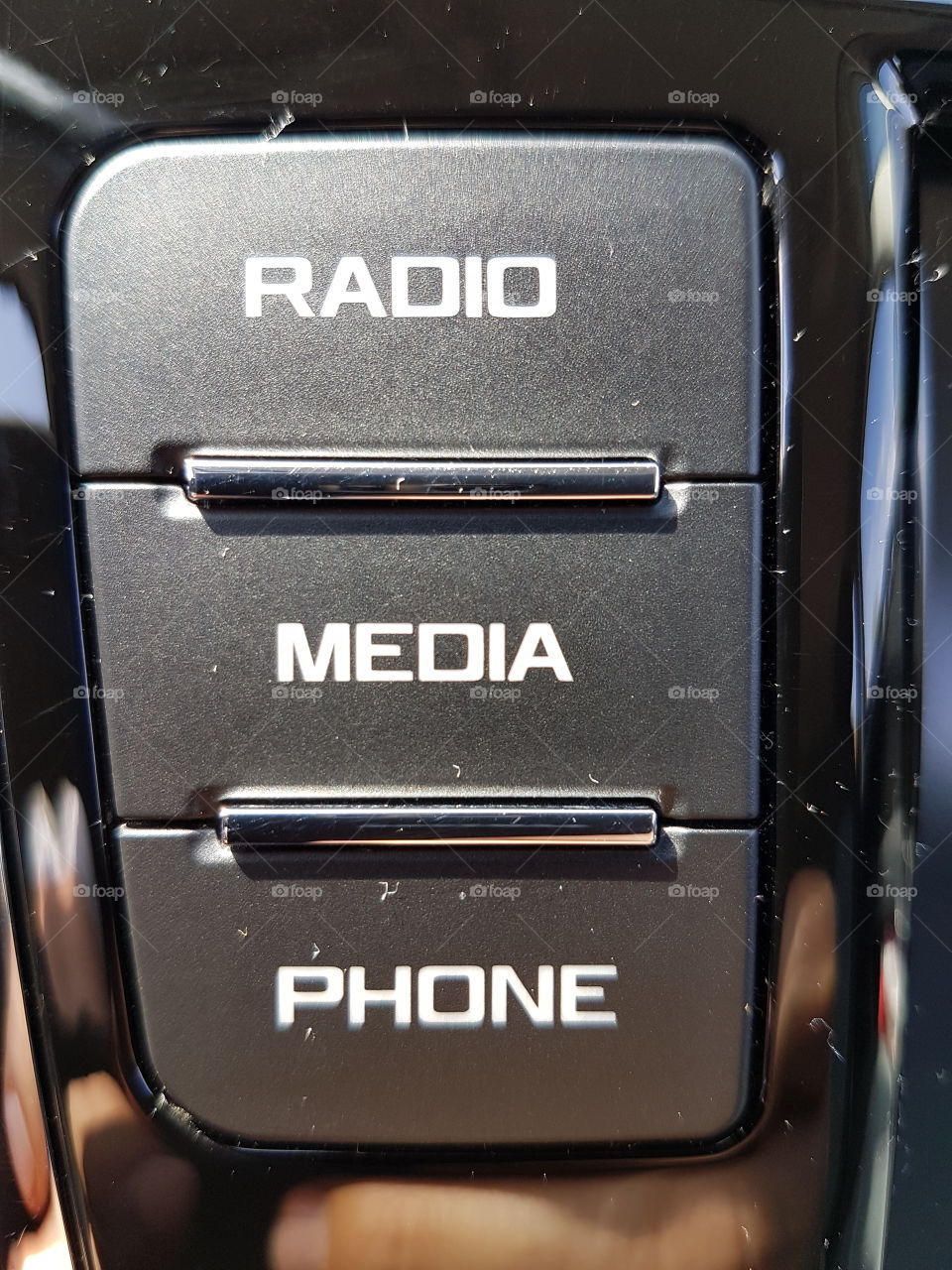 media radio phone button in a passenger car