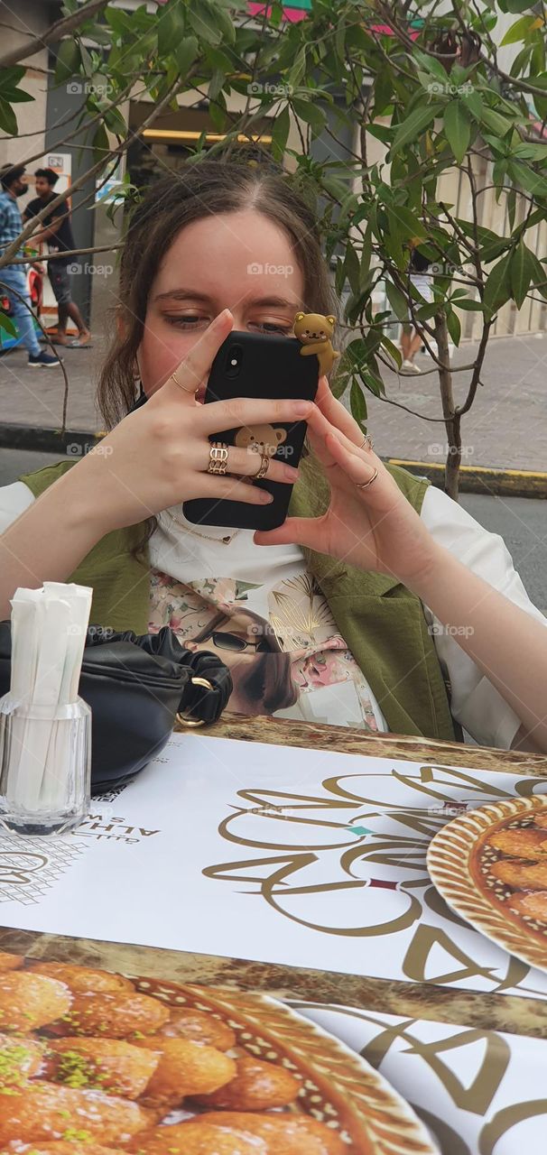 Always busy with her phone 📱