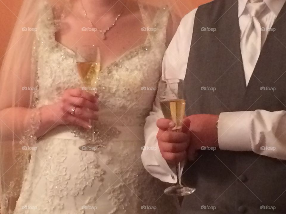 The Toast!. This was taken of the bride and groom's hands and glasses as they listened to the bride's sister give a toast.