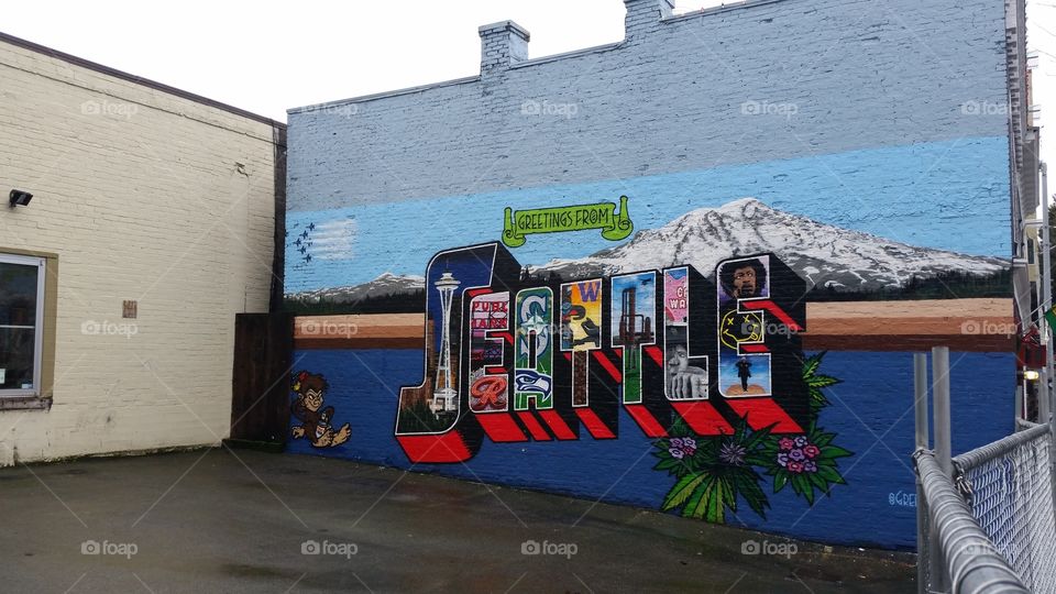 seattle postcard mural. greetings tour mural