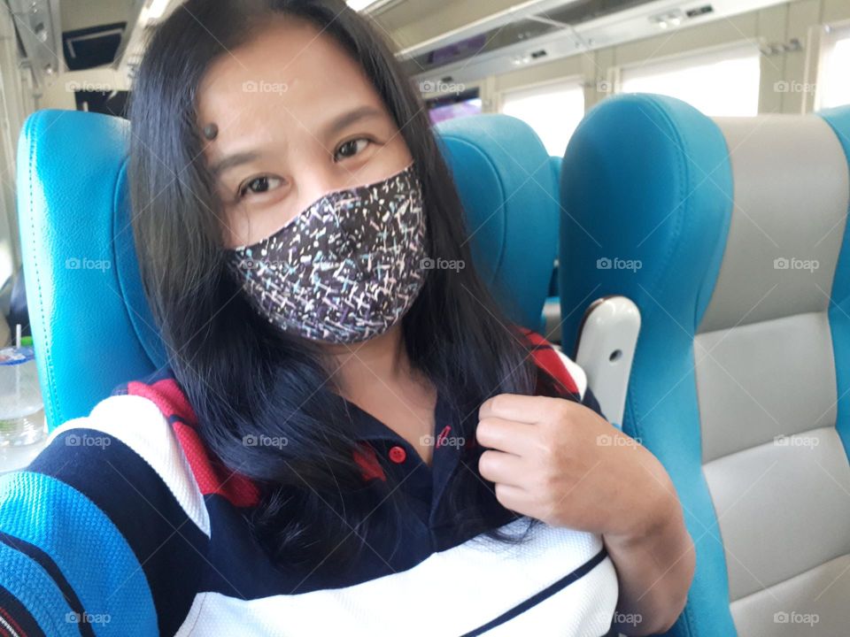 beautiful woman selfie in executive class train