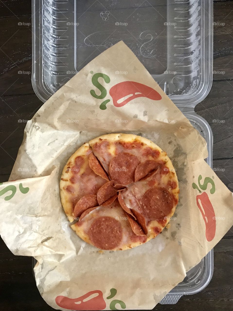 Chili’s restaurant take out pizza. Delicious cheese and pepperoni pizza. USA, America 