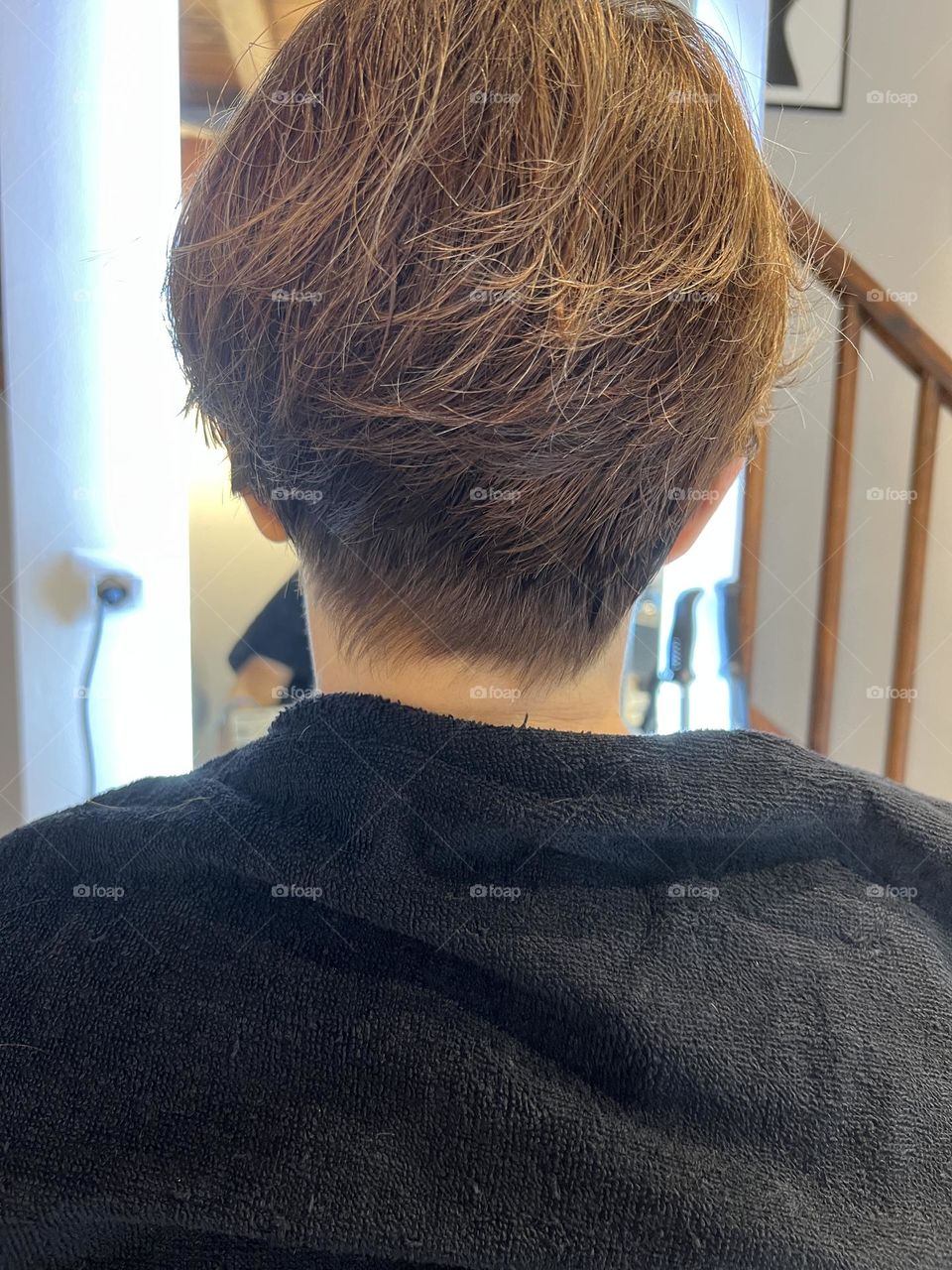 Woman after cutting hair 